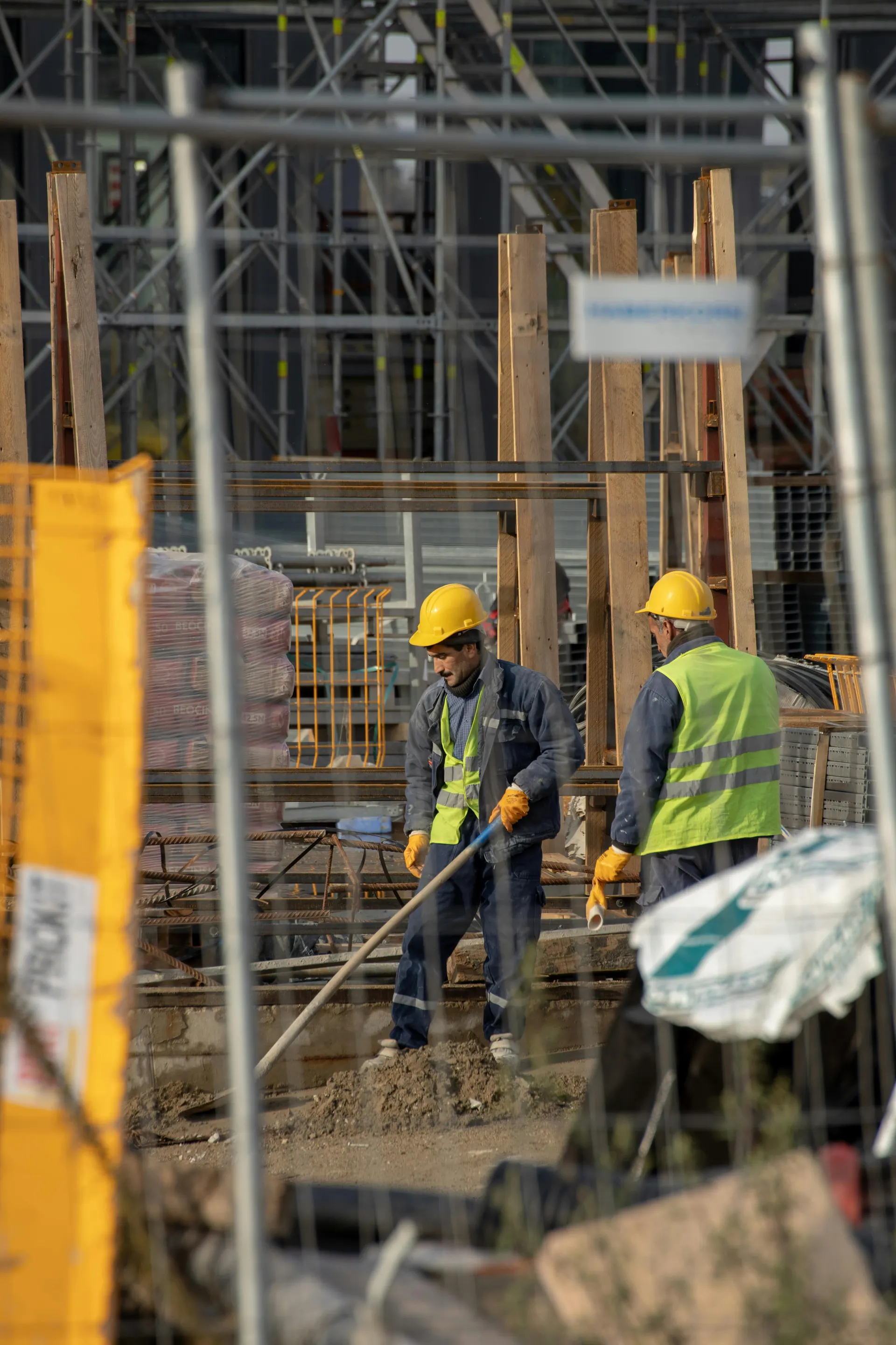 Contractors collaborating on a construction site